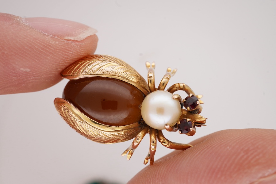 A 14k, cultured pearl, garnet and cabochon stone set bug brooch, 24mm, gross weight 3.4 grams, together with an antique gilt metal and paste set necklace (stones missing), 35cm. Condition - poor and good